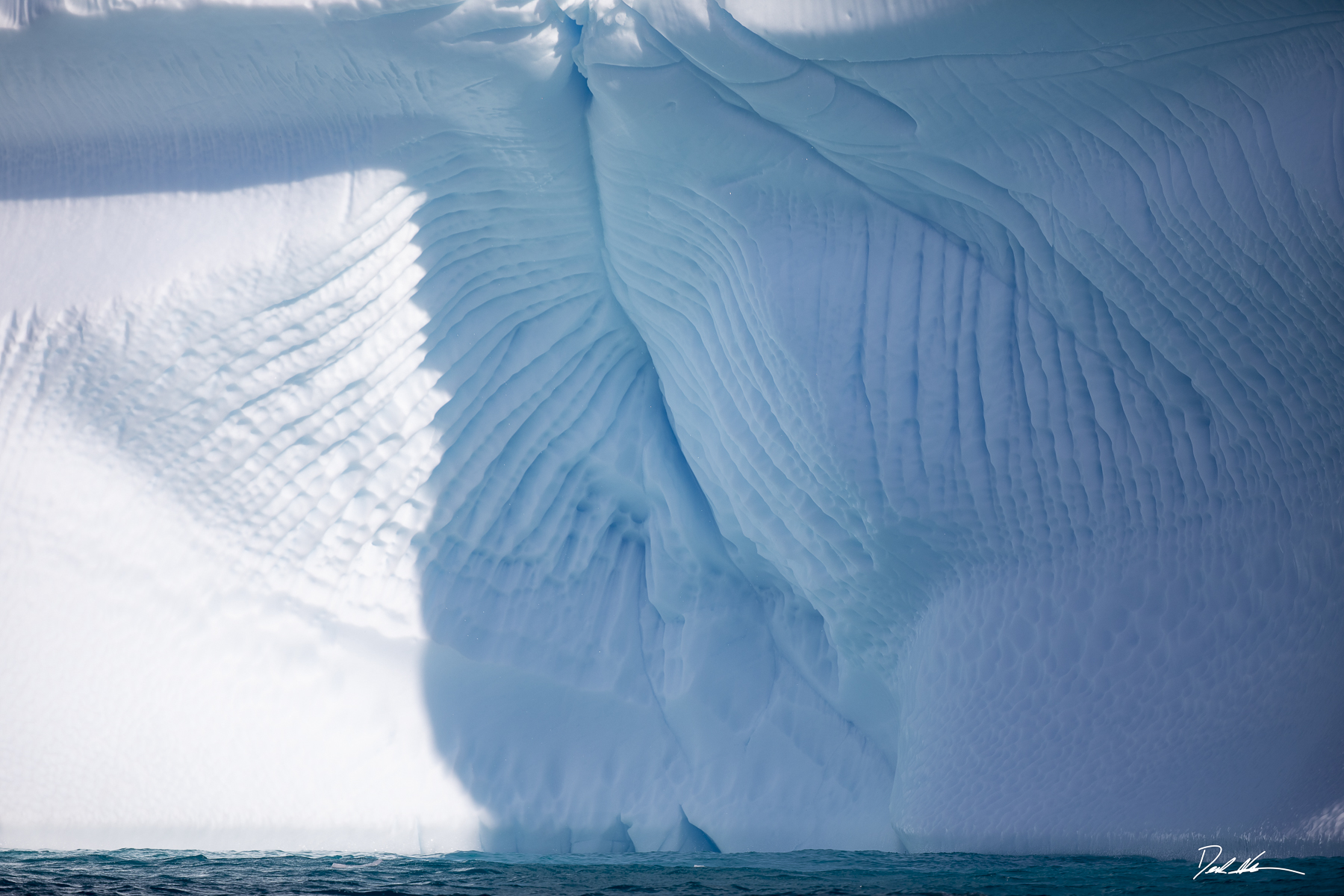 Large iceberg floating in Antartica