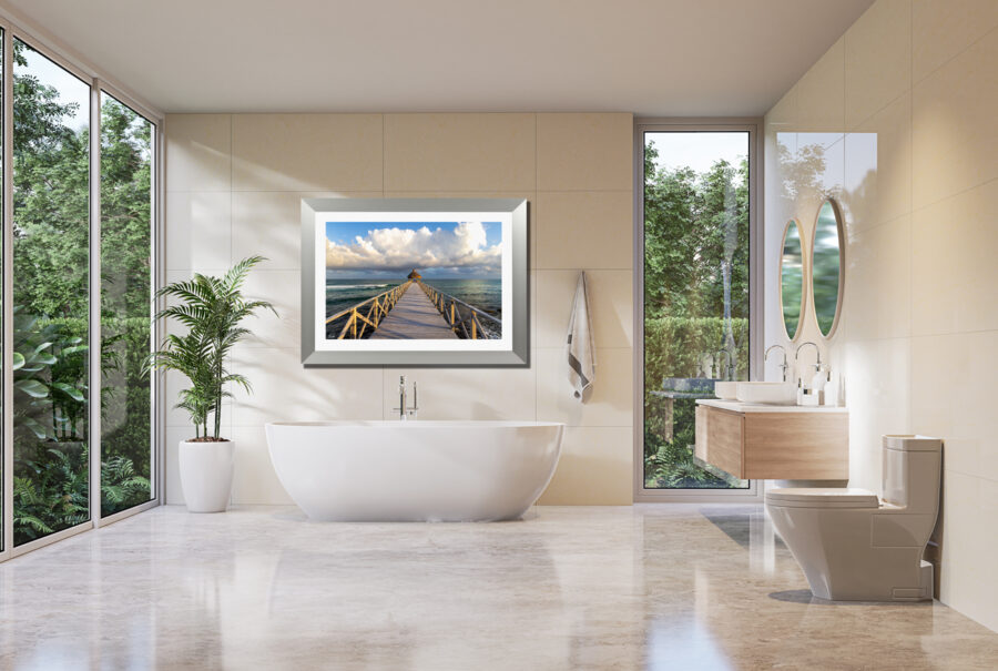 image of a Caribbean beach resort displayed in the bathroom of a luxury hotel