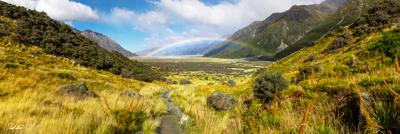 hiking trail between mountains