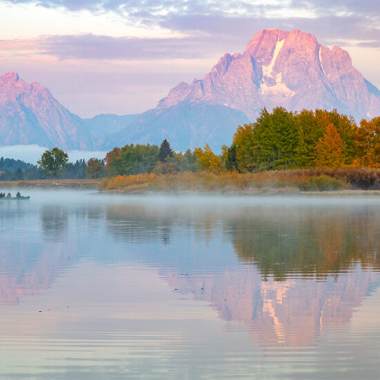 water with reflection of mountains