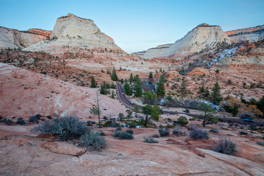 view from Zion National Park going toward the East entrance with gorgeous rocks and desert vegetation 