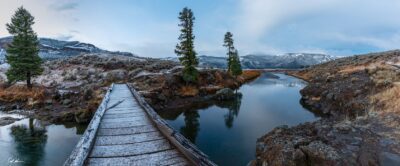 A bridge in the Lamar Valley of Yellowstone National Park covered in frost