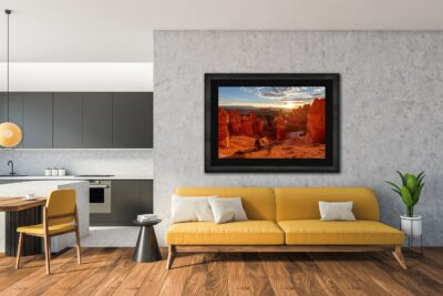 large framed fine art print of Bryce Canyon displayed in the living room of a modern home