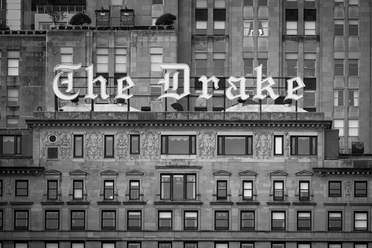 image of the Drake Hotel in Chicago taken in black and white with the famous signage above the hotel
