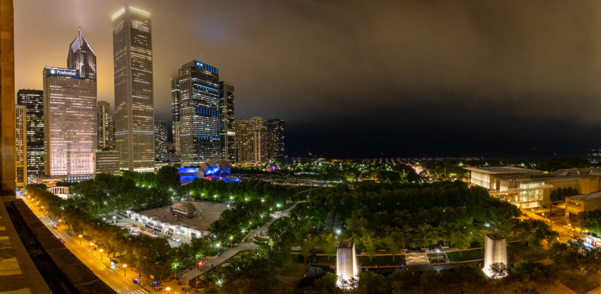 panoramic image taken from Cindy's rooftop at night over Millennium Park