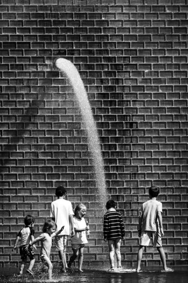image of children playing the Crown Fountain in Millennium Park