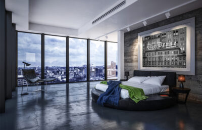 Very large framed image of the Drake Hotel in Chicago displayed above the bed of a modern luxury condo bedroom