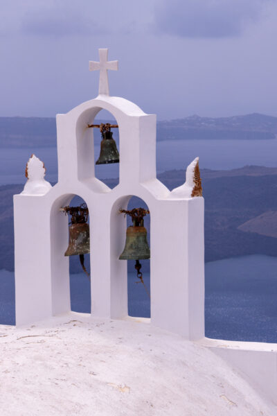 Image of the famous church bell towers in Santorini Greece