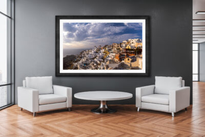Large famed fine art print of Oia in Greece displayed in the lobby of an office
