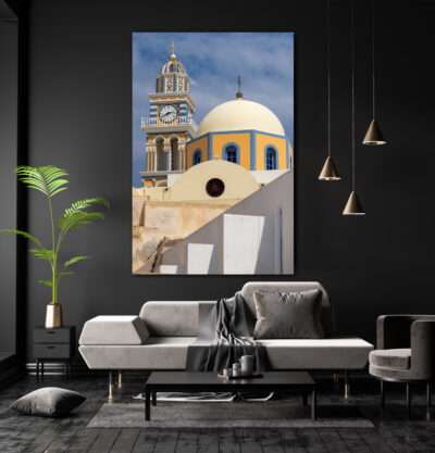 large lumachrome fine art piece of a church in Santorini Greece displayed in the living room of a modern home
