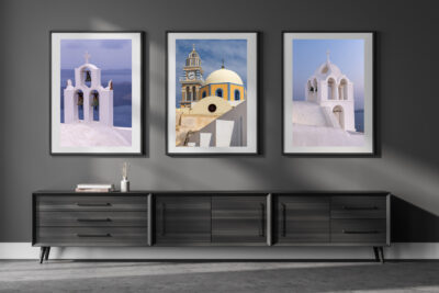 image of three iconic churches on Santorini Island in Greece framed and displayed in the hallway of a luxury home