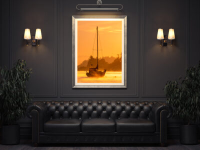 large framed fine art print of Langley Harbor in Washington displayed in the entrance of a luxury hotel