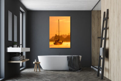 large unframed print of a sailboat in Langley harbor Washington displayed in the bathroom of a luxury home