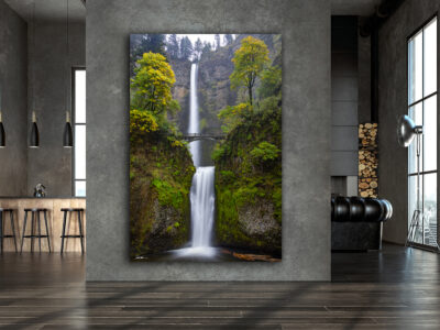very large unframed fine art print of Multnomah Falls in Oregon displayed in a modern apartment