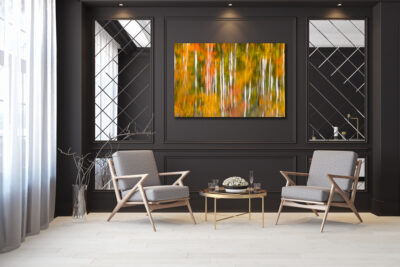 large unframed fine art print of aspen trees reflecting off a lake displayed in the family room of a luxury home