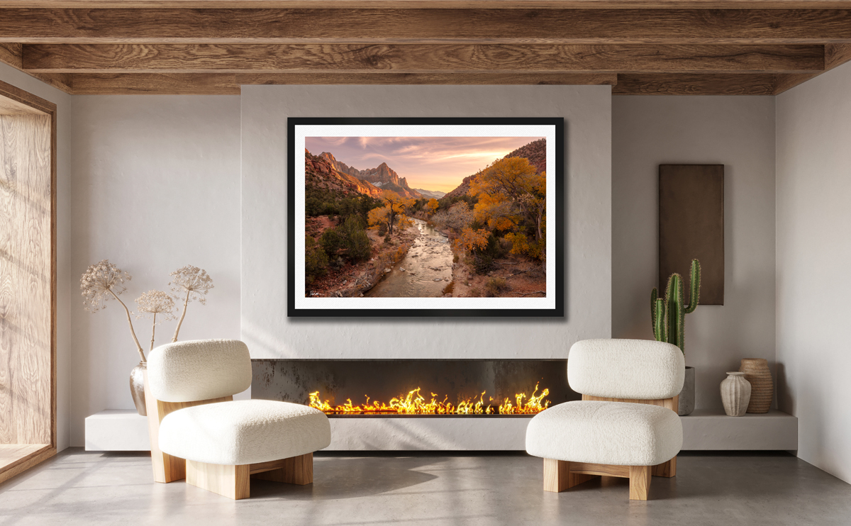 large framed fine art print of the watchman in Zion National Park displayed in the living room of modern luxury home