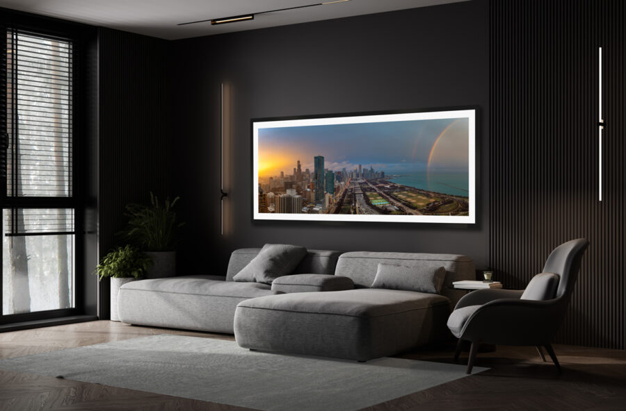 framed panoramic fine art print of Chicago at sunset with a rainbow displayed in a luxury living room.
