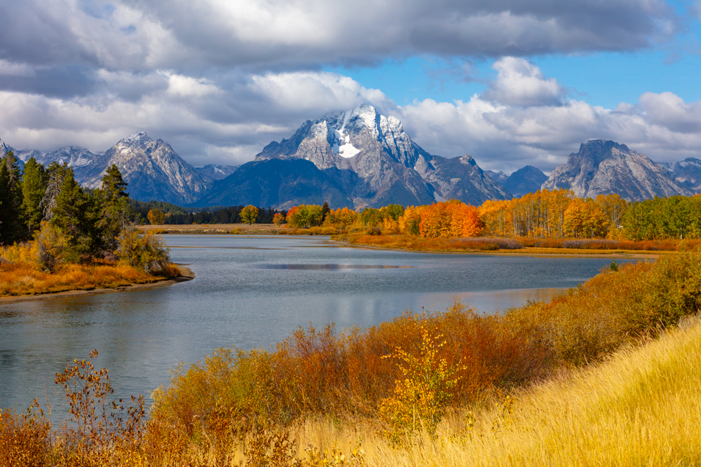 Photograph of the grand teton national park during fall with bright colors