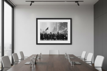 fine art photograph of Chicago residents protesting in the streets covered in snow displayed in an office