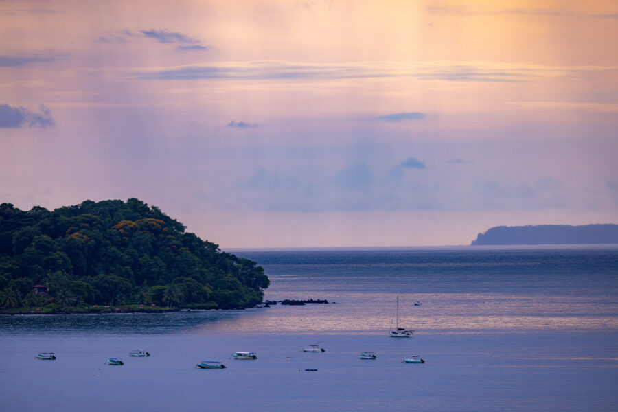 A colorful sunset photo of Drake Bay, Costa Rica